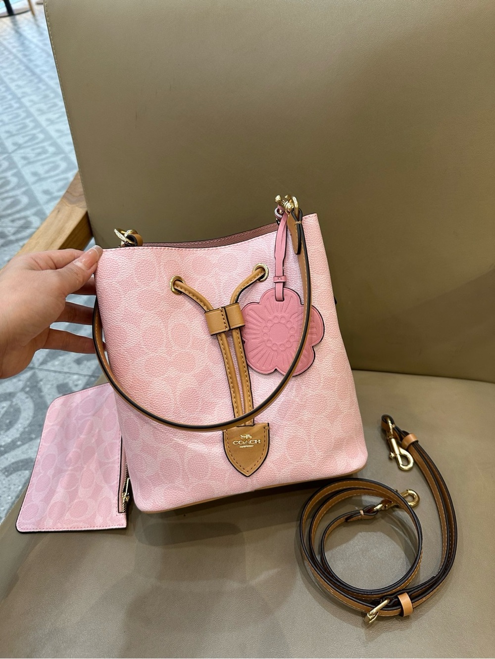 Coach Pink Pebble Leather Drawstring Bucket Bag with Tan Trim and Floral Charm - Picture 3 of 9